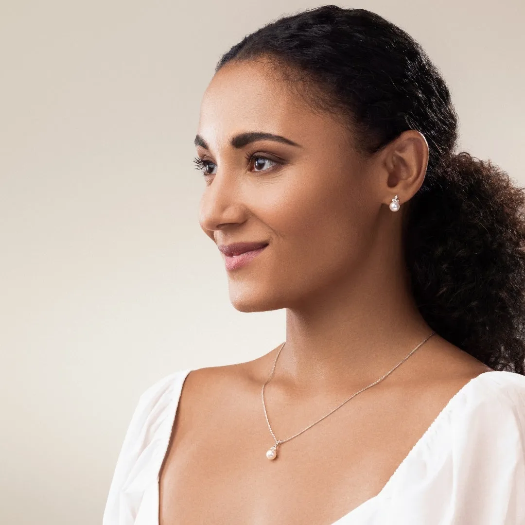 Classic Cultured Pearl and Three Stone Diamond Pendant