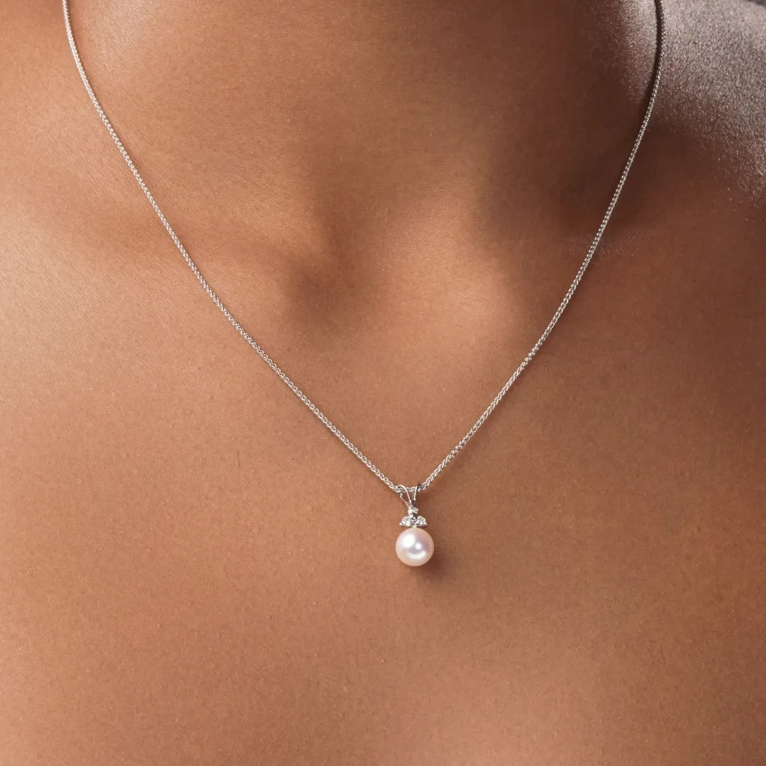 Classic Cultured Pearl and Three Stone Diamond Pendant