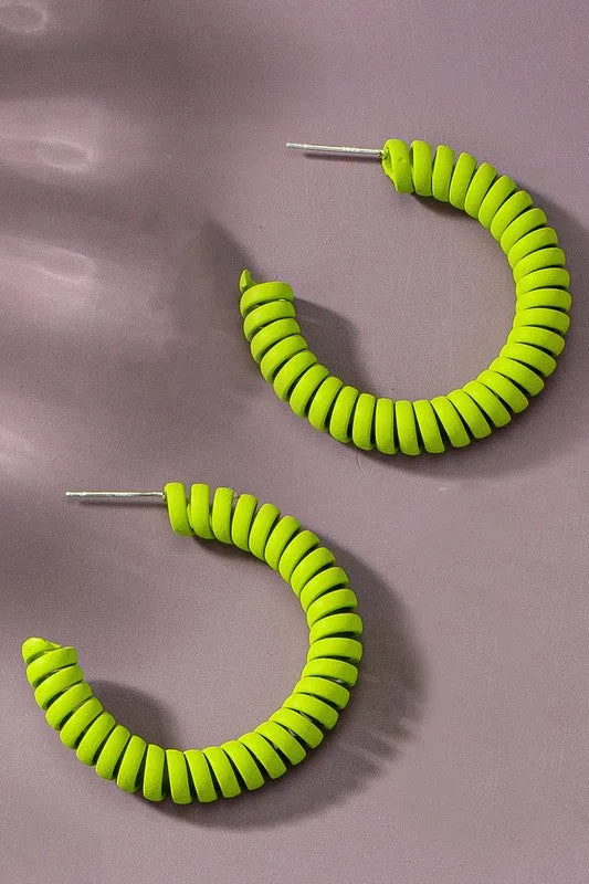 Spiral metal hoop earrings with color coating